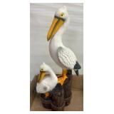 Pelican Figurine on Wood Pile Motif