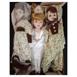 Three Porcelain Dolls in Box