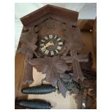 Wooden Cuckoo Clock With Carved Leaf Design