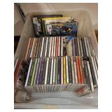 CDs and DVDs in Plastic Storage Bin