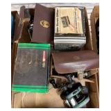 Fishing Reels in Boxes and Cases