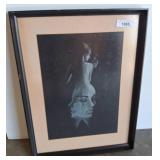 Framed Abstract Artwork Featuring Dual Faces w5