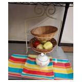 Wire Basket Stand, Placemats, and Ceramic Teapot