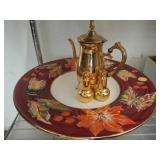 Gold-Toned Teapot, Shakers, and Floral Charger
