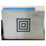 Two Quilting Cutting Mats With Grids