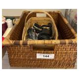 Two Woven Baskets with Electronic Accessories