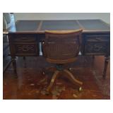 Wood Desk With Leather Top and Cane-Back Chair
