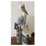 Figurine of Two Pelicans on Weathered Posts
