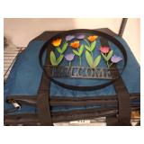 Metal Welcome Sign and Blue Foldable Bag