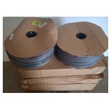 Industrial spool of foam wire and plastic bracket