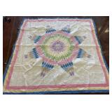 Star Pattern Quilt with Multi-Color Design