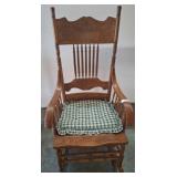 Ornate Wooden Rocking Chair with Cushion