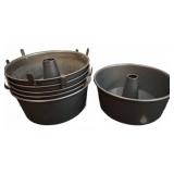 Stack of Metal Tube Cake Pans