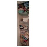 Linen Closet With Towels and Toiletries