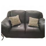 Black Loveseat with Patterned Pillows
