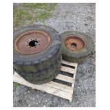 SET OF 750X16 WELL USED TOW MOTOR TIRES ON RIMS