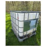 NON-FOOD GRADE 275 GALLON FLUID TOTE W/ CAGE
