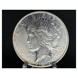 1927-D PEACE SILVER DOLLAR