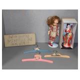 (2) DOLLS, CLOTHES HANGERS, DECORATIVE SIGN