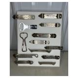 (13) BOTTLE OPENERS ON CANVAS DISPLAY