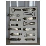 (14) BOTTLE OPENERS ON CANVAS DISPLAY