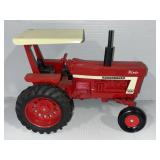 ERTL INTERNATIONAL 1066 TRACTOR W/ ROPS DIE-CAST