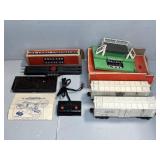 LIONEL MILK STATION WITH (2) CARS