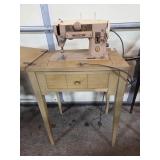 OLDER SINGER SEWING MACHINE IN BLOND CASE