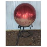 LARGE RED METAL GAZING BALL ON METAL STAND