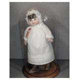 LARGE GLASS CLOCHE WITH BABY DOLL