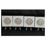 Four Franklin Half Dollars