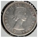 1955 Canada Silver Dollar Coin with Canoe Design