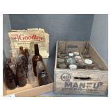 Bottles, Newspapers, and Crate