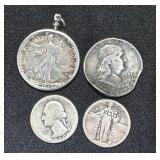 Four US Silver Coins With Visible Damage