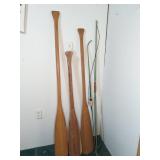 Three Wooden Oars and two Bows