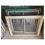 Two Wood Framed Windows