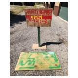 Two Wooden Trading Post Signs