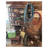 Shelving Contents with Hoses and Tools