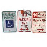Three Metal Parking Signs