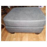 Gray Upholstered Ottoman with Wooden Legs
