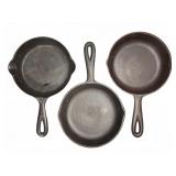 Three Cast Iron Skillets, 3 & 3D