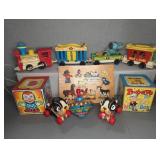 Fisher-Price Toys, Tin Music Boxes, and Puzzle Lot