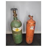 Two compressed gas cylinders (oxygen, acetylene)