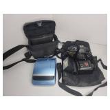Pentax film camera with lens, flash, and Polaroid