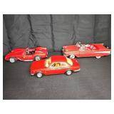 3 Red Die-Cast Model Cars