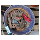 Five gallon bucket full of hooks