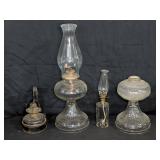 Four Antique Clear Glass Oil Lamps