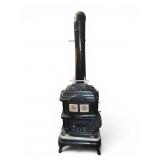 Red Cross Cast Iron Parlor Stove with Tile Panels