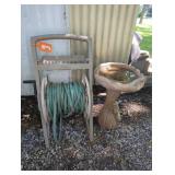Plastic Hose Reel Cart and Concrete Bird Bath