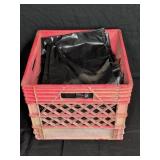 Red Plastic Crate With Black Plastic Trash Bags